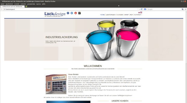 Úvodná stránka Lackdesign s farebnými plechovkami farby a fotografiou produktu